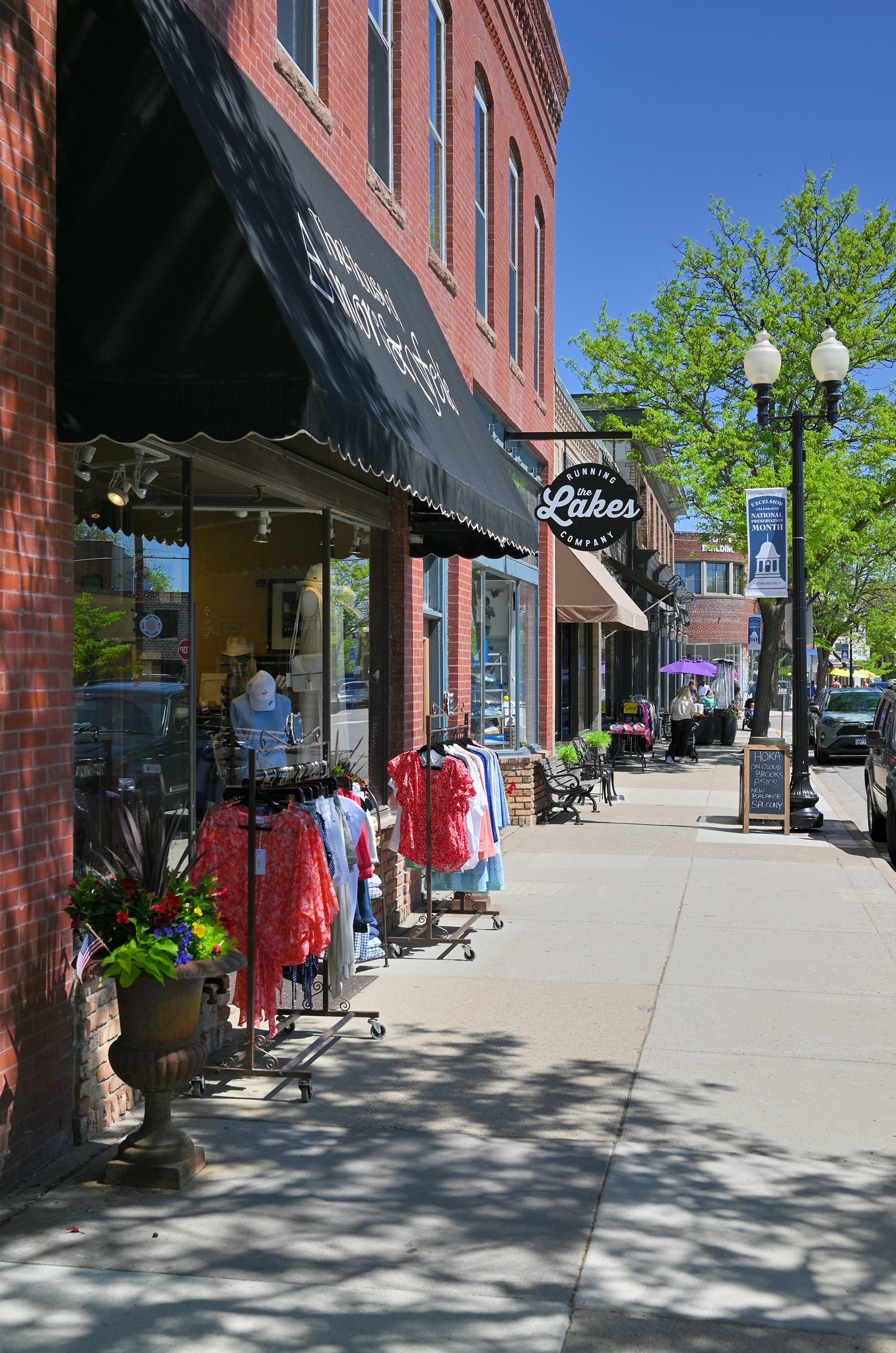 Water Street sidewalk and storefronts in downtown Excelsior on an ordinary day