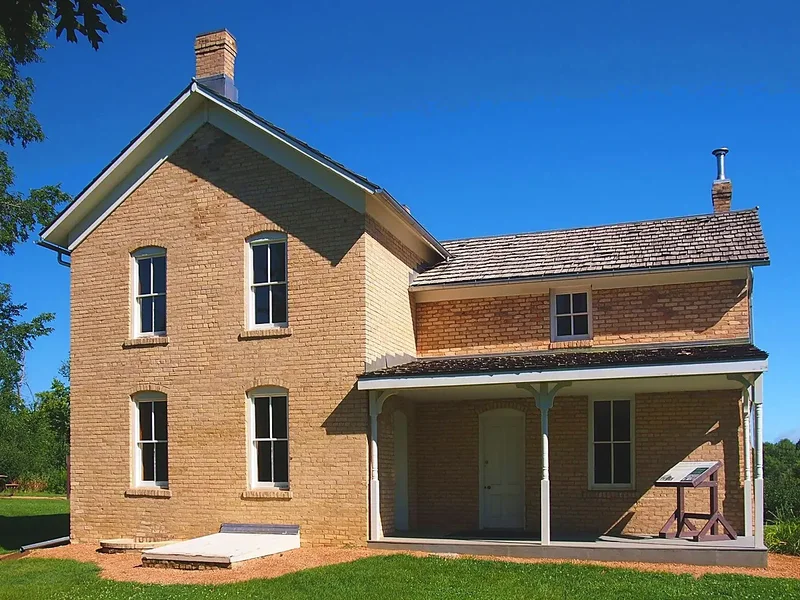 The yellow brick Wendelin Grimm farmhouse