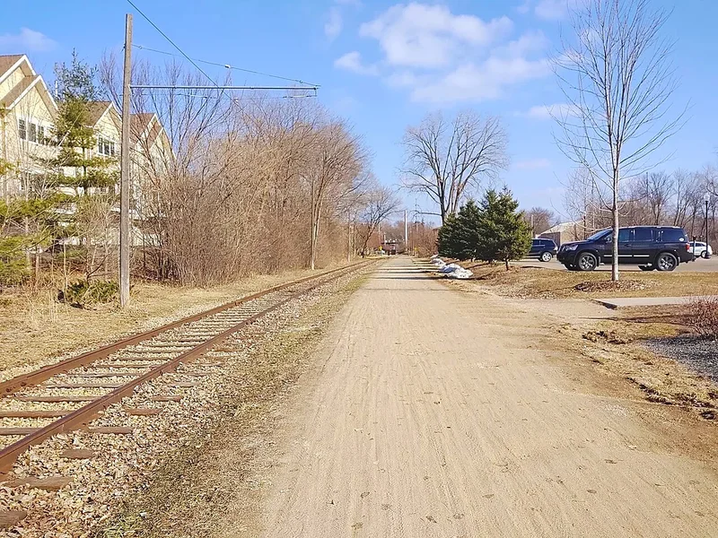 The Lake Minnetonka LRT Regional Trail, a wide gravel path, in Excelsior