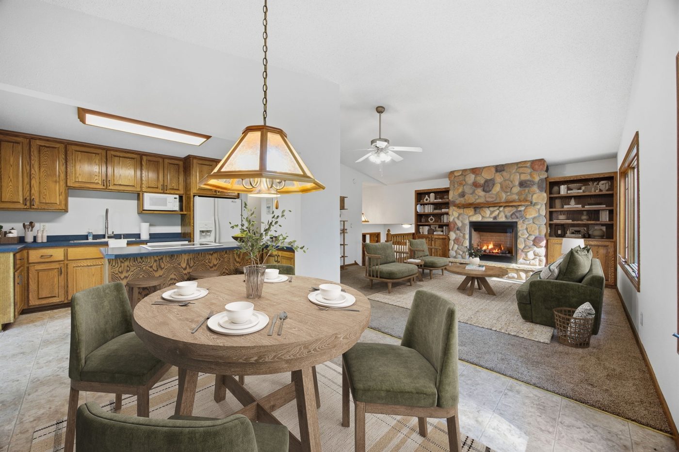 Kitchen with oak cabinetry and dining area